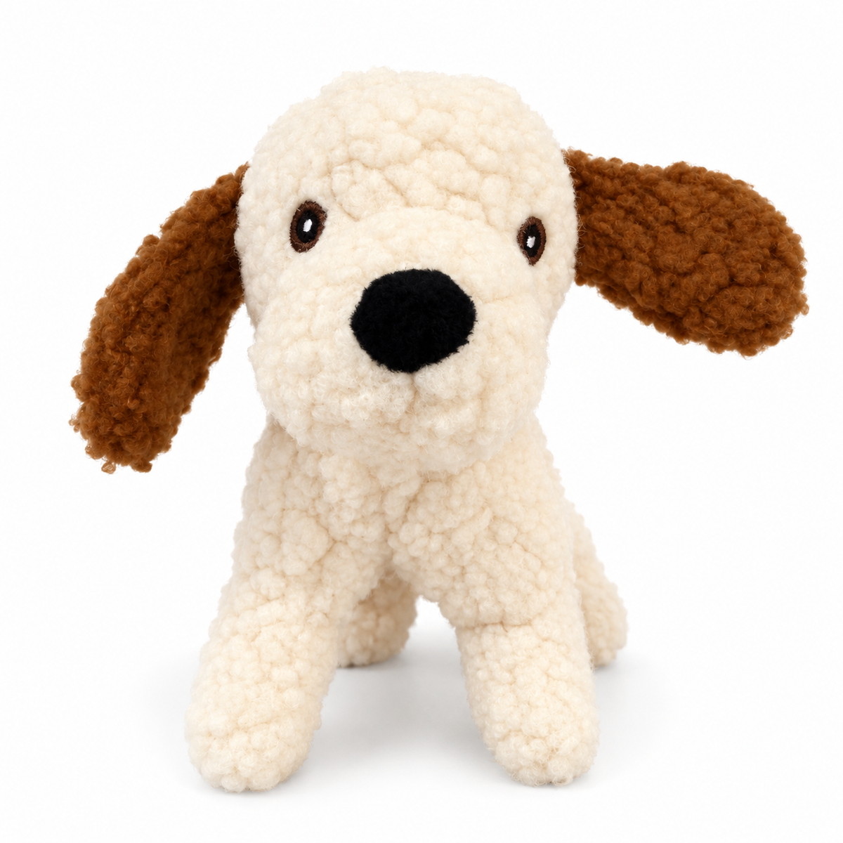 Cream curly plush dog toy with brown floppy ears front view