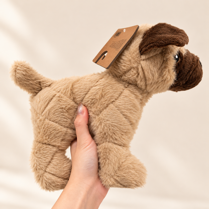 Pugsley plush pug dog toy held in hand